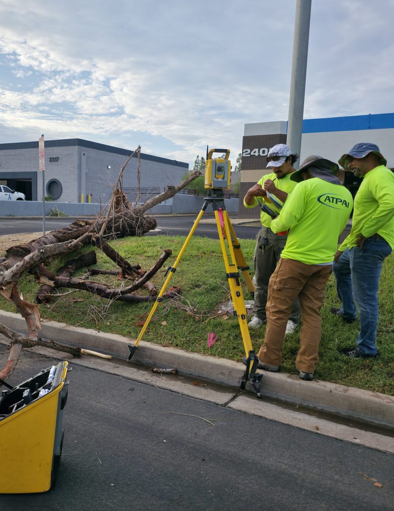 A Team Professional Associates field crew receiving total station training outside the company’s Tempe, Arizona office. Photo by Ben Gonzales